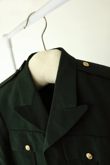 Hangerbee Padded Clothing Hangers hanging a military jacket. Our Museum quality hangers are perfect for the long term storage and preservation of garments of all sizes.